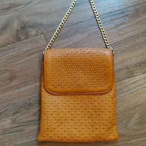 Small orange faux leather bag